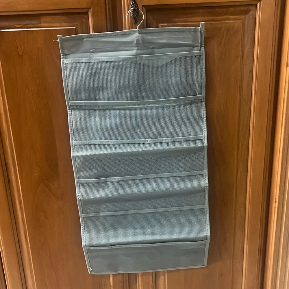 Gray Hanging organizer for closet.